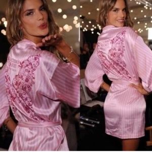 Victoria’s Secret fashion show robe supermodel wrap backstage runway